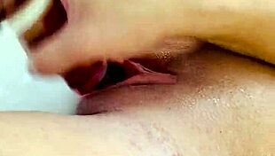 Savannah Storm Masturbates In The Tub With A View As She Fucks Her Big Ass And Tits With Glass Dildo.