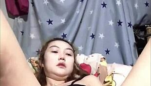 Why is this amateur Japanese girl getting so horny with solo masturbation leading to squirting?