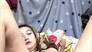Why is this amateur Japanese girl getting so horny with solo masturbation leading to squirting?