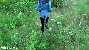 Brunette fucks in forest publicly.