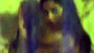 The beautiful girl from India dances gracefully while revealing her elegant body.