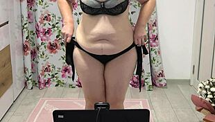 Big ass MILF shakes in panties on webcam
