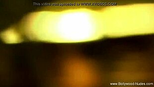 The beautiful girl from India dances gracefully while revealing her elegant body.