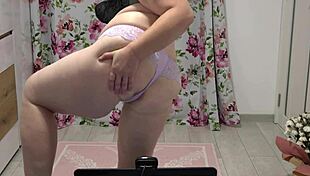 Big ass MILF shakes in panties on webcam