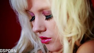 beautiful blonde girl sensually toys her wet pussy with dildo