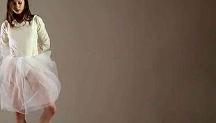 Blonde Gymnast Flexes Acrobatically