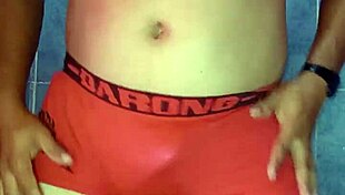 Mexican model dances seductively in satin lingerie and pantyhose