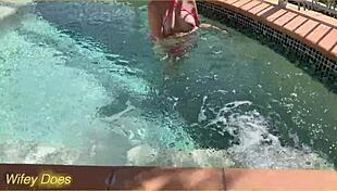 hey, check this out - my wife flashing her big tits right in the hotel pool, totally daring!