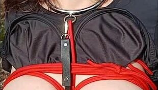 Slave in forest bondage and submission