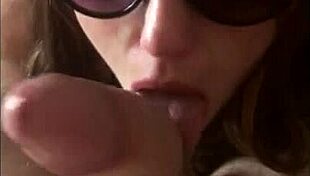 Wife gives pov blowjob to huge white cock.