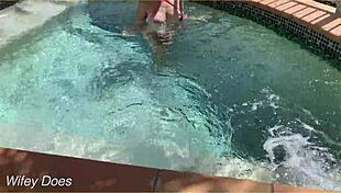 hey, check this out - my wife flashing her big tits right in the hotel pool, totally daring!