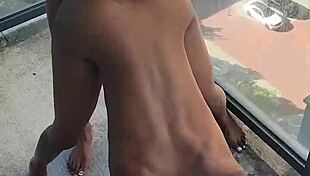 Kashofficials is getting strapped by Renity Love on the balcony. So hot!