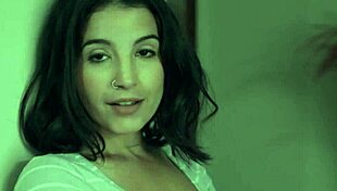 Two hot babes, a brunette and an ebony, engage in 69 position. They lick each other's pussies passionately