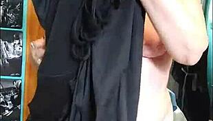 Trying on a new outfit in the bedroom