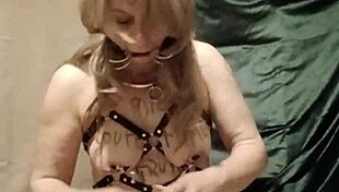 slave self-bondage with harness and magic wand