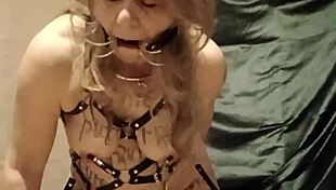 slave self-bondage with harness and magic wand