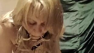 slave self-bondage with harness and magic wand