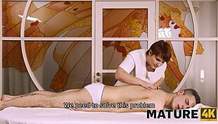 Mature4K Masseuse Feels Excited Flashing Her Charms In Front Of The Client And Giving Them To Him