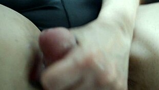 she gives a hot oiled handjob while rubbing her pussy, leading to a monster cock cumshot