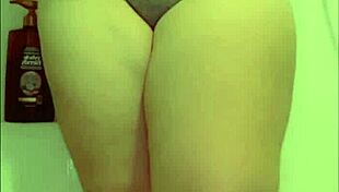 Chubby BBW milf pees in toilet, showing her hairy pussy and big tits in homemade fetish video