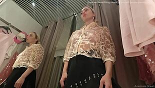 Amazing girl with big boobs changing clothes in fitting room