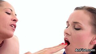 Wacky lesbo bombshells fist spread twats and anuses.