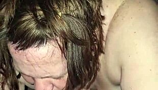 Milf rides foot while sucking huge cock, teasing the viewer with her actions