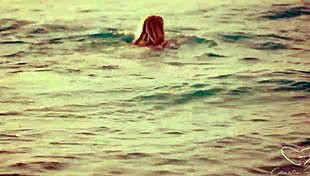 Charlie Forde and Olive Gee making out passionately at the beach sunset 😍