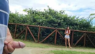 Risky Street Handjob Caught by Beautiful Redhead in Public