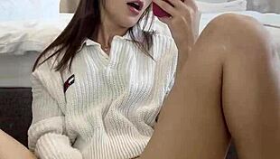 Ellie Leen fingers her hairless shaved pussy in front of the mirror