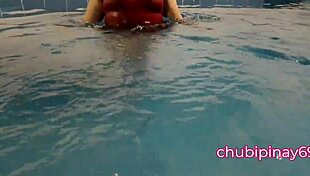 In the public swimming pool, she FLASHES her BOOBS