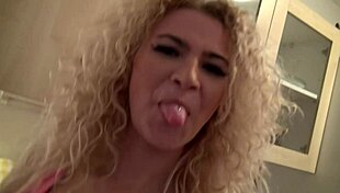 Curly Blonde Shows Off Her Pretty Pussy in the Kitchen