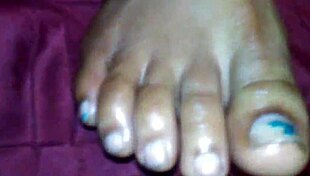 Ebony beauty delivers intense foot job with cumshot