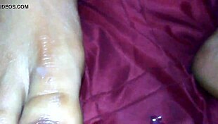 Ebony beauty delivers intense foot job with cumshot