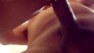 The young woman experiences intense anal fucking in a casual group setting, exploring her desires with multiple partners