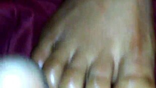 Ebony beauty delivers intense foot job with cumshot