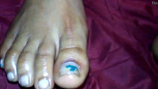 Ebony beauty delivers intense foot job with cumshot