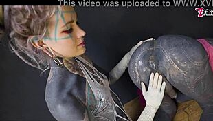 Tranny gets anal stretched by tattooed dominatrix in ass fisting