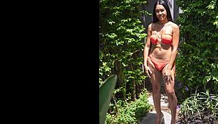 Sindy Models Her Orange Swimsuit