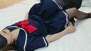 Cute uniform girl blindfolded in pantyhose