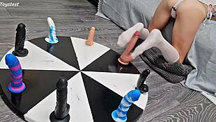 The petite stepsister spins the wheel of dildos and achieves her orgasm