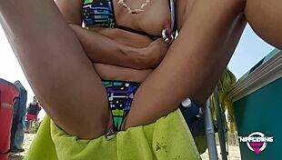 kinky mother flashing pierced pussy and nipples at public beach