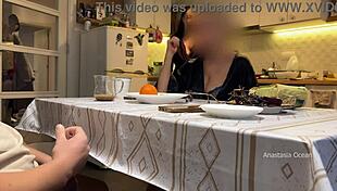 In the kitchen, my husband jerks under the table in front of my step mom and me