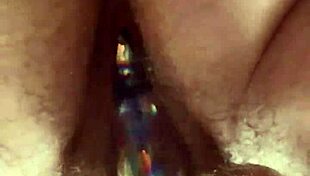 Up close, curvy girl with hairy pussy uses glass dildo for masturbation 😍