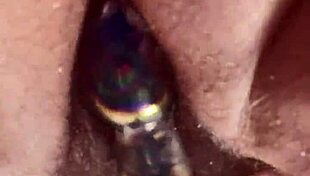 Up close, curvy girl with hairy pussy uses glass dildo for masturbation 😍