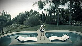 Jillian Jansen cools off in the pool after sunbathing with Seth