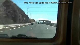 Young Adult Engages in Playful Activities in Car