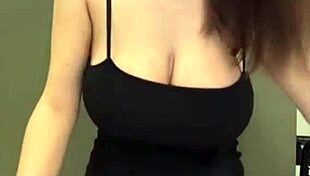 I watch my slender stepmother show her milky tits and lick her nipples