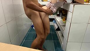 Teaching my stepdaughter household chores leads to intense fucking in the kitchen, covering her with cum.