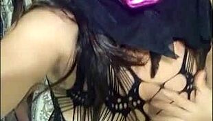 delicious companion lady wears a mask on halloween to model erotically and touch her vagina